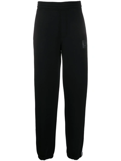 Neil Barrett Side Stripe Track Pants In Black