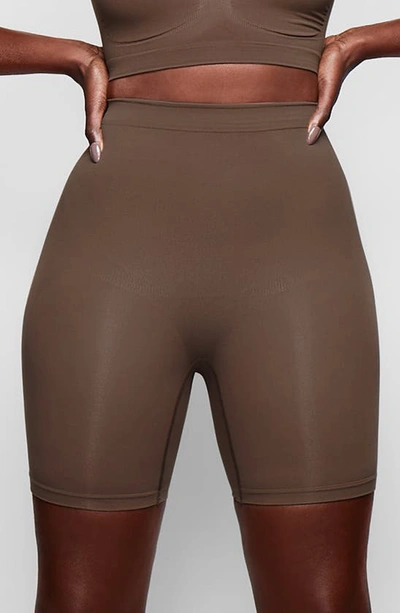 Skims Sculpting Mid Thigh Shorts In Oxide