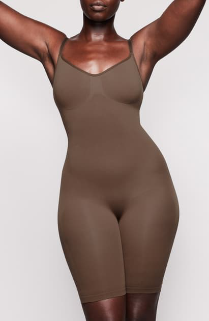 sculpting bodysuit skims