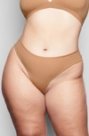 Skims Naked High Waisted Thong In Ochre