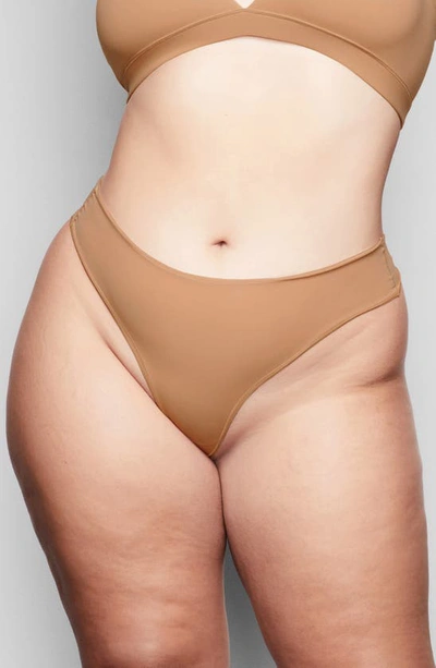 Skims Naked High Waisted Thong In Ochre