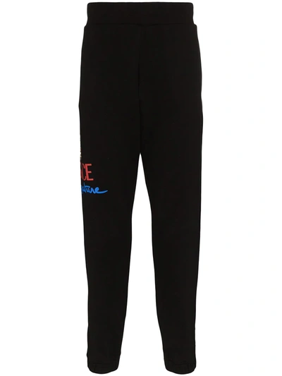 Versace Logo-print Cotton-jersey Track Pants In Black