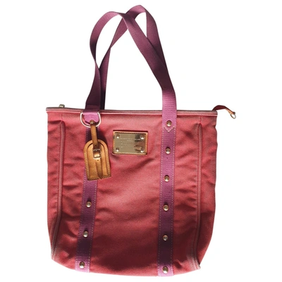 Pre-owned Louis Vuitton Antigua Handbag In Red