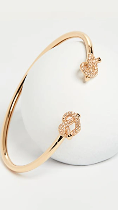 Kate Spade Loves Me Knot Pave Flex Cuff In Clear/gold