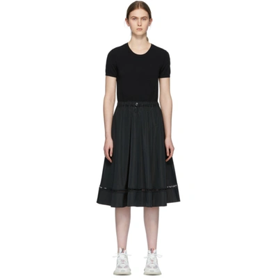 Moncler Embroidered Logo Knitted A-line Dress In 999 Black