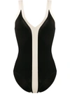 Sandro Two-tone Knitted Bodysuit With Straps In Black