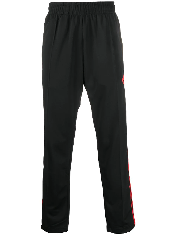 black and red adidas track pants