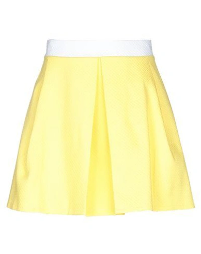 Nineminutes Mini Skirts In Yellow