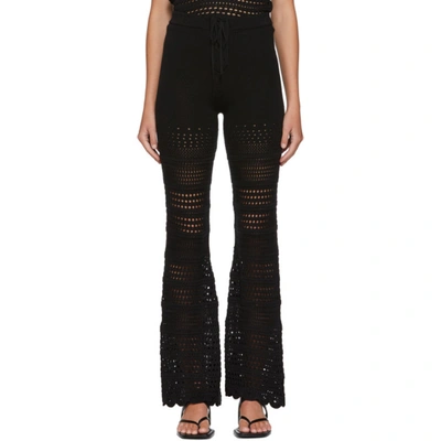 Amiri Ribbed Flared Trousers In Black