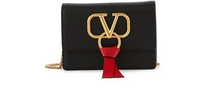 Valentino Garavani Vring Clutch Bag In Nero-rouge Pur