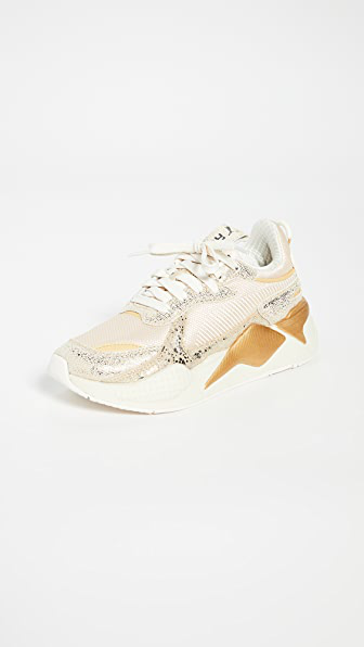 gold low top pumas