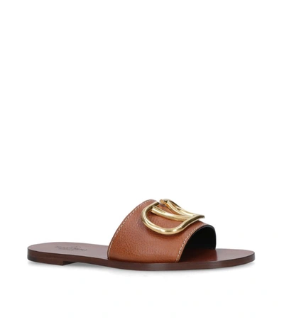 Valentino Garavani Go Logo Pebbled-leather Slides In Brown