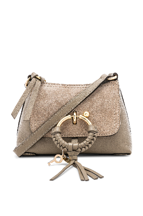 mini joan leather crossbody bag