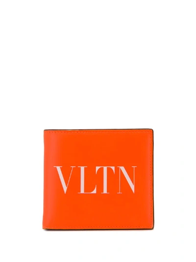 Valentino Garavani Logo Printed Leather Billfold Wallet In Orange