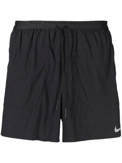 Nike Flex Stride Performance Athletic Shorts In Pacific Black/reflective Silver