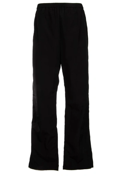 Balenciaga Flared Cotton Trousers In Rubber Black
