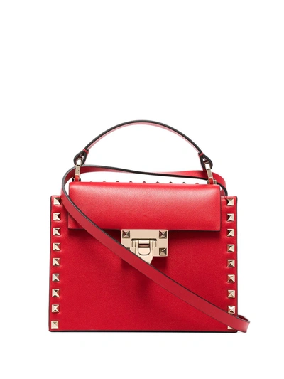 Valentino Garavani Rockstud Grained Leather Top Handle Bag In Red