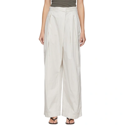 Lemaire Off-white Asymmetrical Trousers In 903 Kraft G