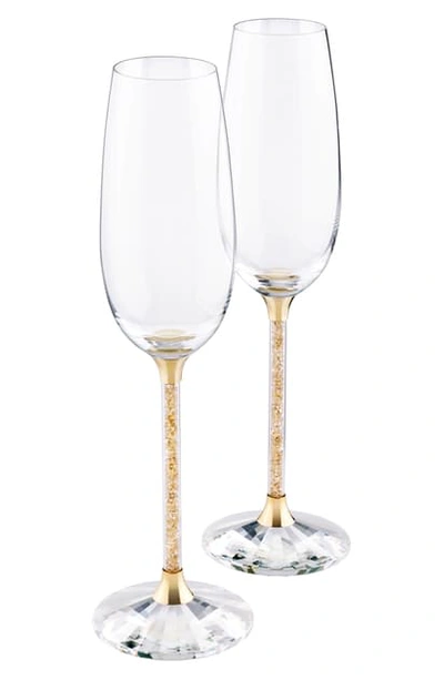 Swarovski Crystalline Set Of 2 Toasting Flutes In Gold Tone