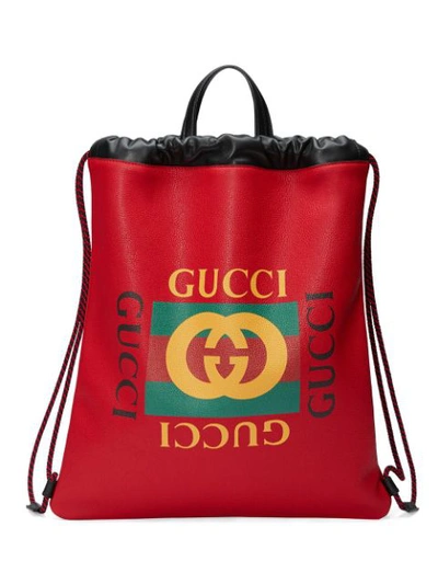Gucci Printed Leather Drawstring Backpack In Red
