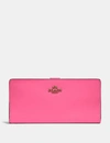 Coach Skinny Wallet In Brass/confetti Pink