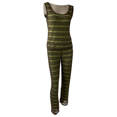 Pre-owned Herve Leger Jumpsuit In Green