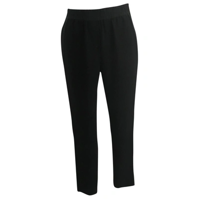 Pre-owned Dkny Carot Trousers In Black