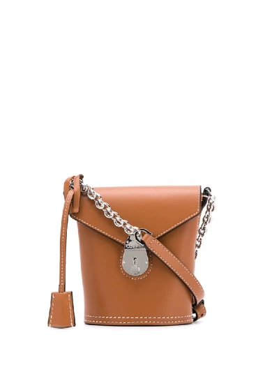 Calvin Klein Foldover Push-lock Bucket Bag In Brown