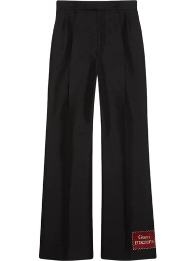 Gucci Flared Wool Trousers In Black