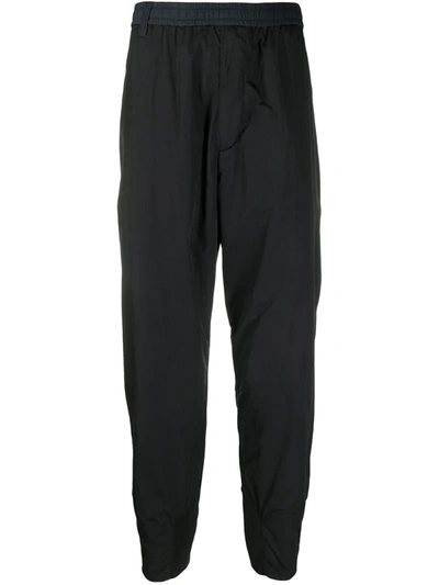 White Mountaineering Easy Tapered Trousers In Black