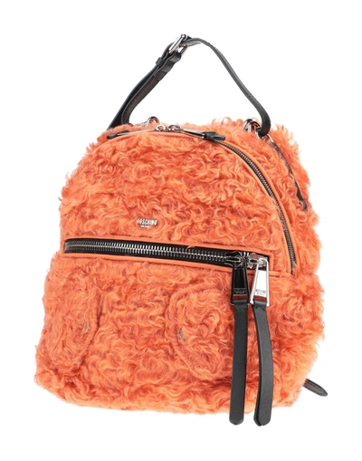 Moschino Backpacks & Fanny Packs In Orange