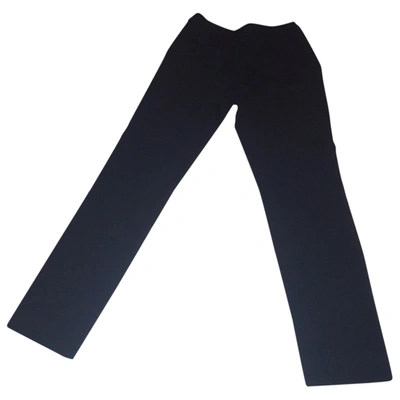 Pre-owned Moschino Wool Straight Pants In Black