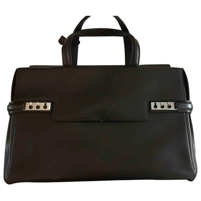 Pre-owned Delvaux Tempãªte Leather Handbag In Brown