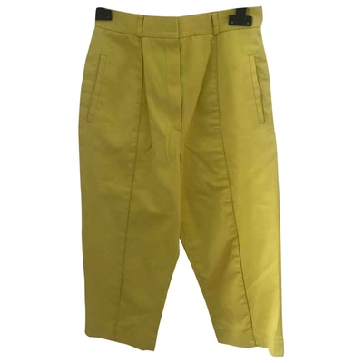 Pre-owned Givenchy Trousers In Yellow