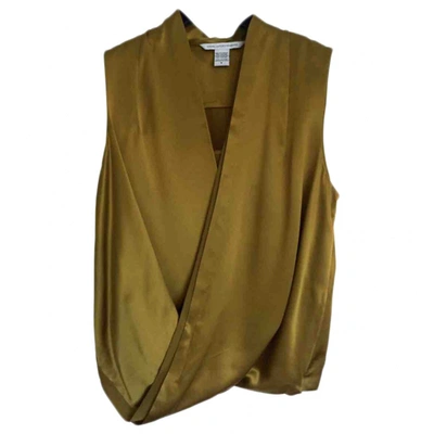Pre-owned Diane Von Furstenberg Silk Blouse In Gold