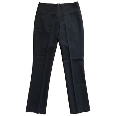 Pre-owned Donna Karan Wool Straight Trousers In Black