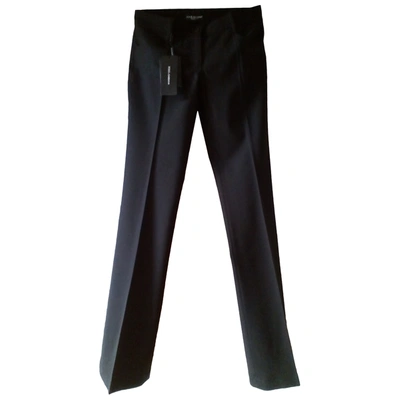 Pre-owned Dolce & Gabbana Wool Trousers In Black