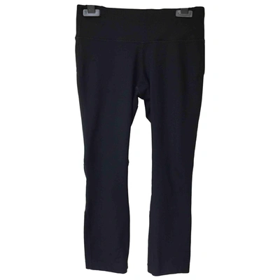Pre-owned Nike Black Synthetic Trousers