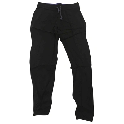 Pre-owned Maje Trousers In Black
