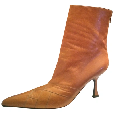 Pre-owned Versace Leather Ankle Boots In Orange