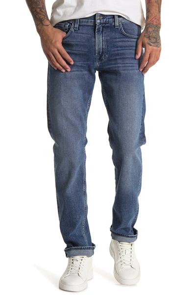 7 For All Mankind Slimmy Tapered Kind To The Planet Jeans In Deckard