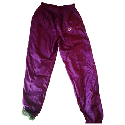 Pre-owned Nike Purple Trousers
