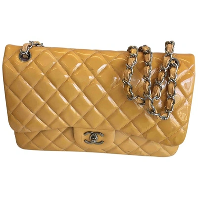 Pre-owned Chanel Timeless/classique Patent Leather Crossbody Bag In Yellow