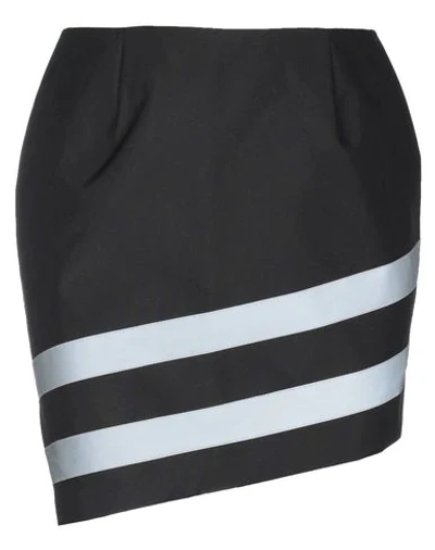 Gcds Mini Skirts In Black