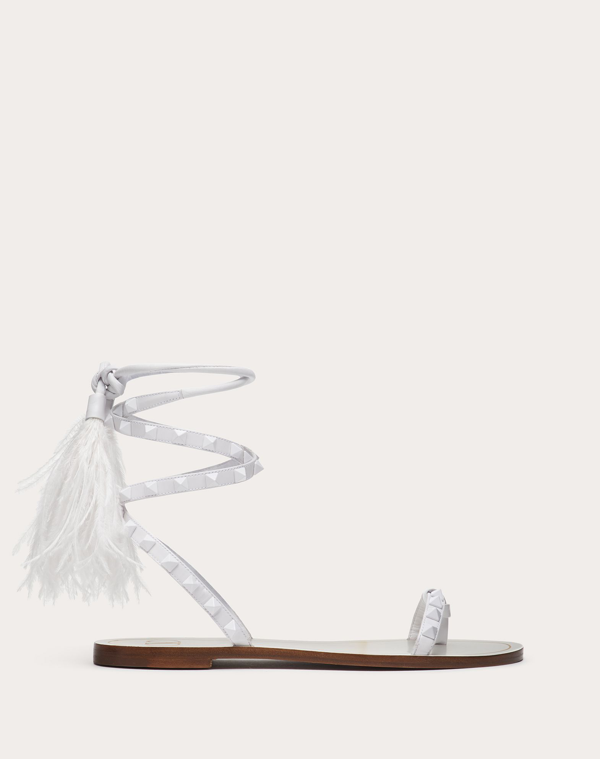 white tassel sandals