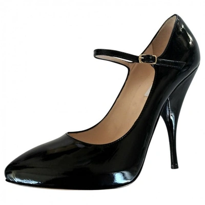 Pre-owned Moschino Patent Leather Heels In Black