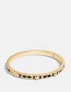 Coach Signature Stone Hinged Bangle In Black In Gold/black