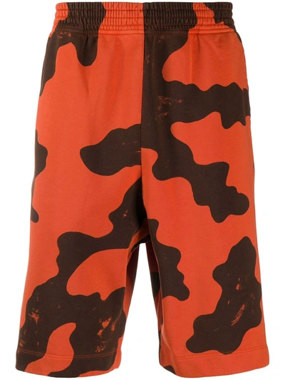 Etudes Studio Racing Camo Shorts In Orange