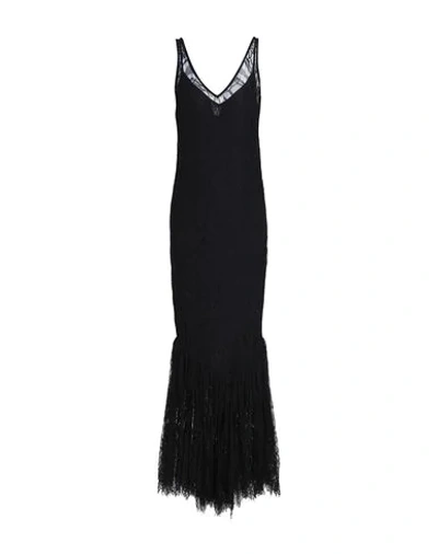 De La Vali Long Dresses In Black