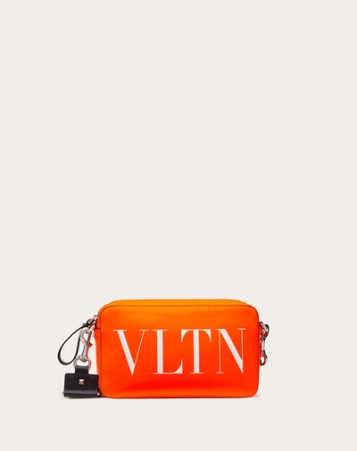 Valentino Garavani Uomo Vltn Fluorescent Leather Crossbody Bag In Florescent Orange